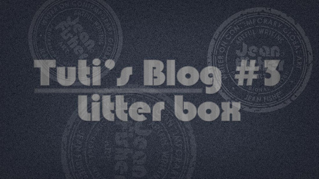 Litter box text on a fabric background